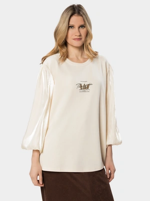 Нарядная блузка с пышными рукавами