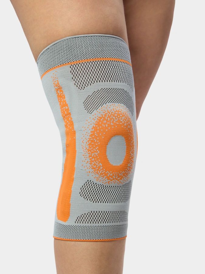 Суппорт колена с боковой поддержкой и защитой